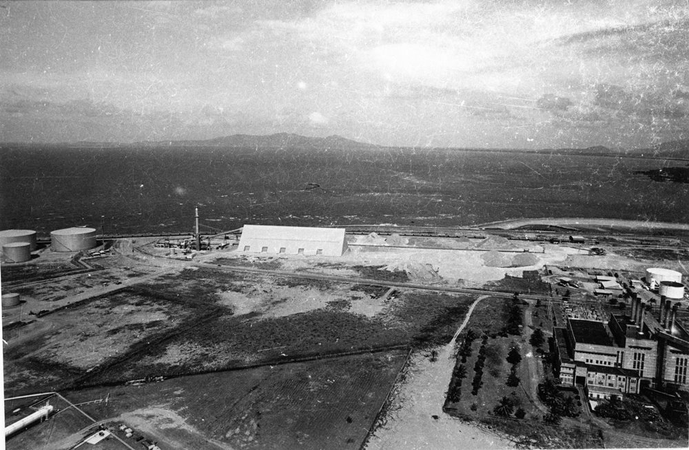 Rock phosphate storage and drying area, oil tanks and the South Townsville power house, aerial view, 1977