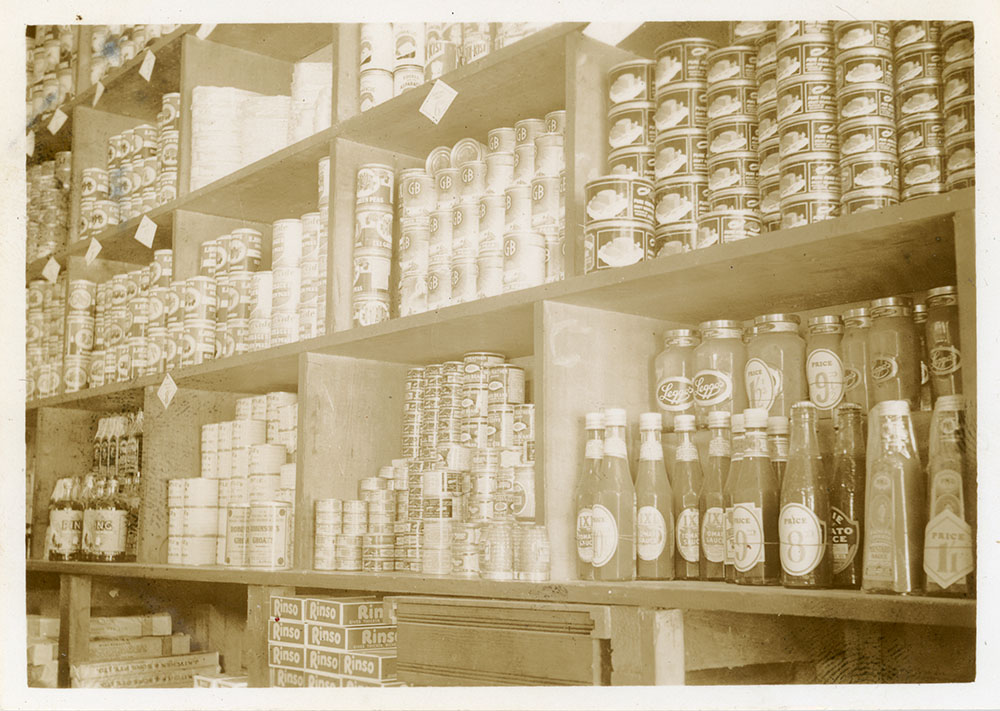 Stock and advertising in Philip Leong's first shop, Townsville, 1940's