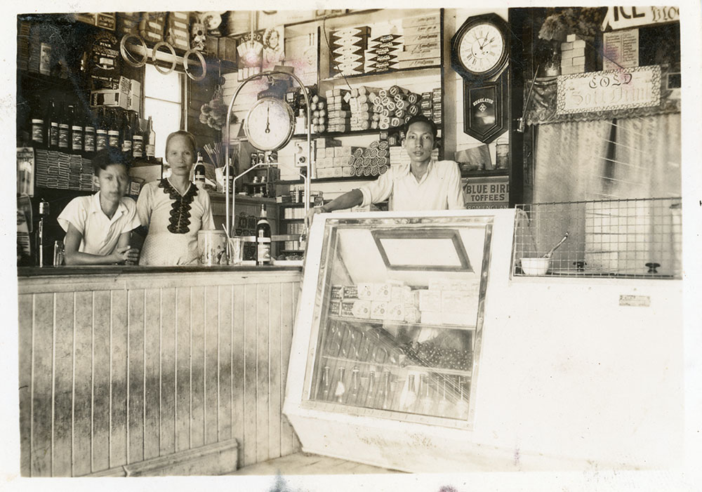 Philip Leong, his mother and Ron Leong in the first shop, Townsville, 1940's