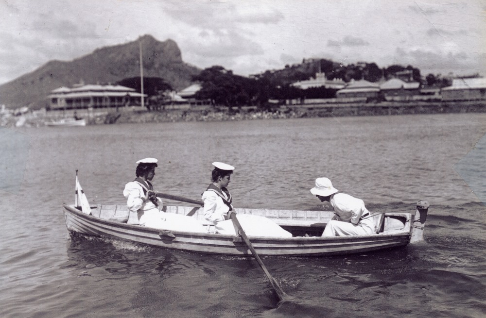 Myra Rendle and friends rowing on Ross Creek, Townsville, ca.1905