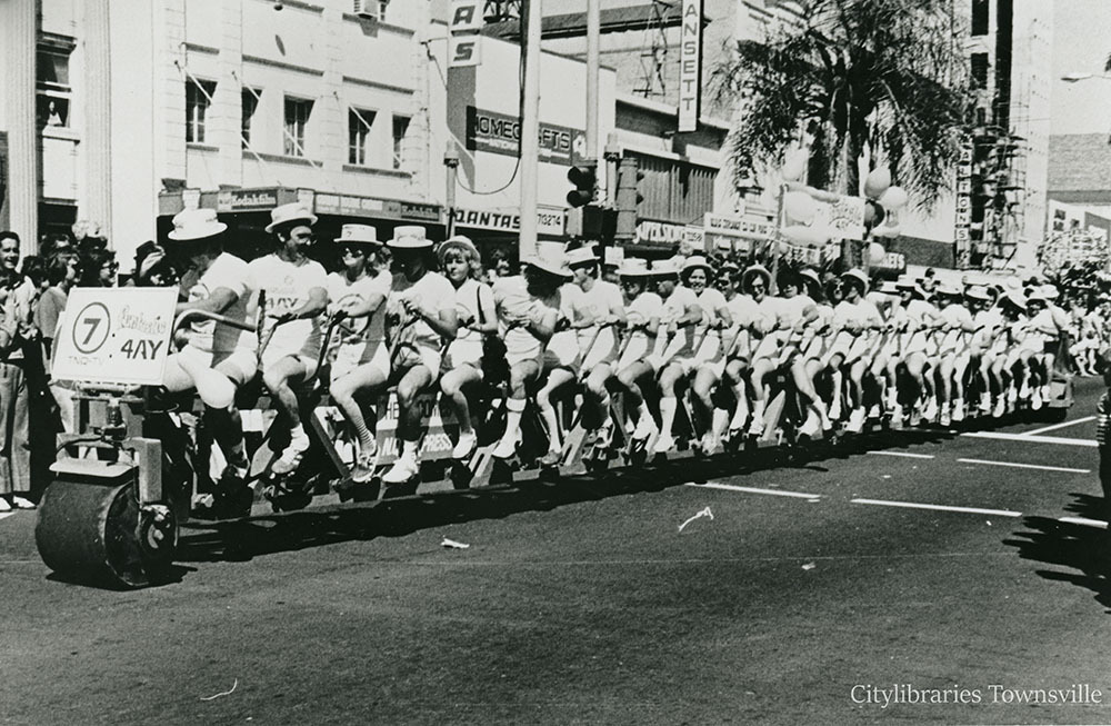 Fun cyclists in the Pacific Festival parade, Flinders Street, Townsville, 1979