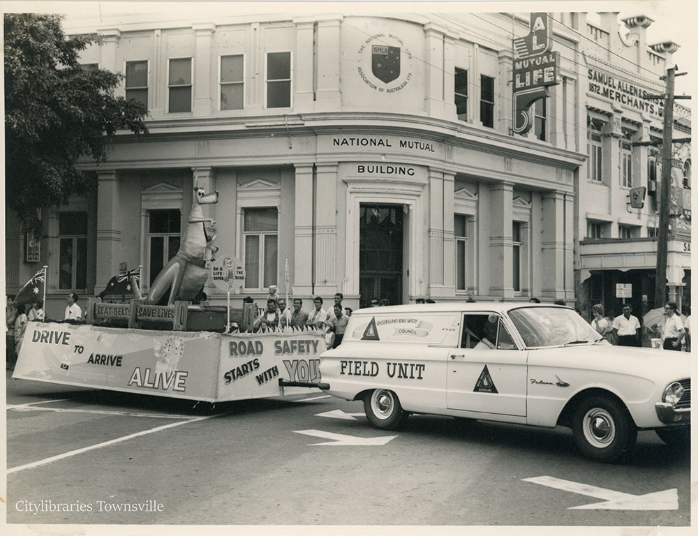 Queensland Road Safety Council's entry in the Centenary Parade, corner of Flinders and Denham Street, Townsville, 7 November 1964