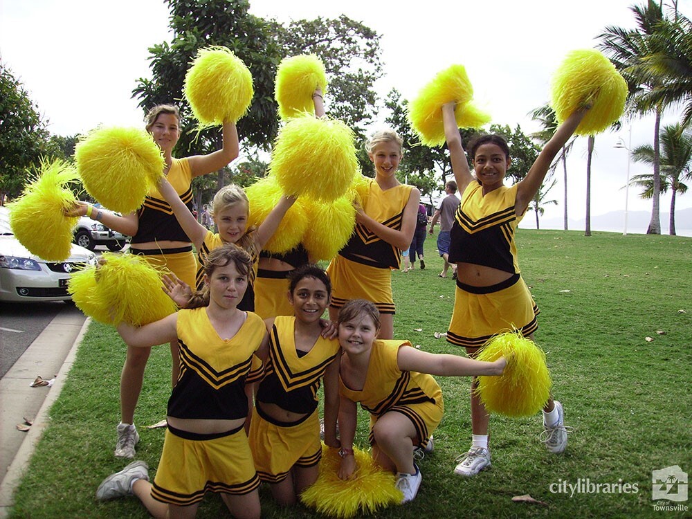 Performing group posing after the Tropigo Carnival parade at Cultural Fest, The Strand, Townsville, 18 August 2007