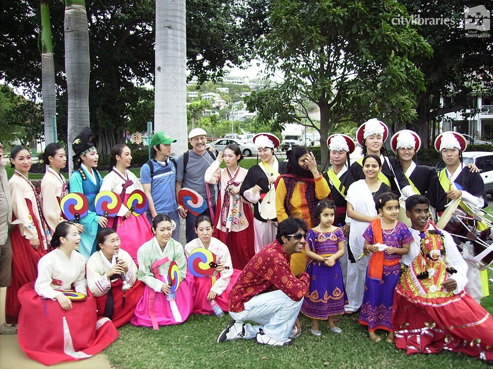 Performers from Suwon City Korea, with members of the Indian Cultural Society after the Tropigo Carnival parade at Cultural Fest, The Strand, Townsville, 18 August 2007