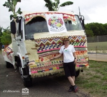 Staff member in front of the Townsville Tongan Group float in the Tropigo Carnival parade at Cultural Fest, The Strand, Townsville, 18 August 2007