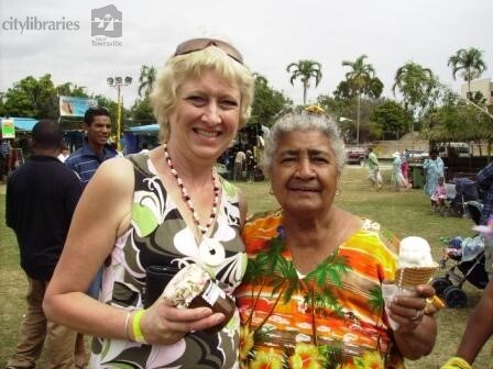 Maggie Baison, Papua New Guinea Group leader with volunteer at Cultural Fest, Strand Park, Townsville, 19 August 2007