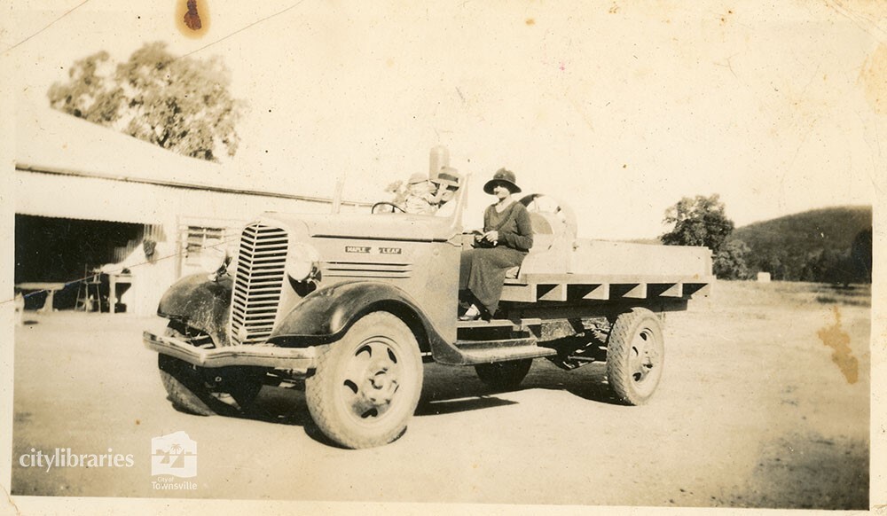 Person sitting on a tractor, 1934