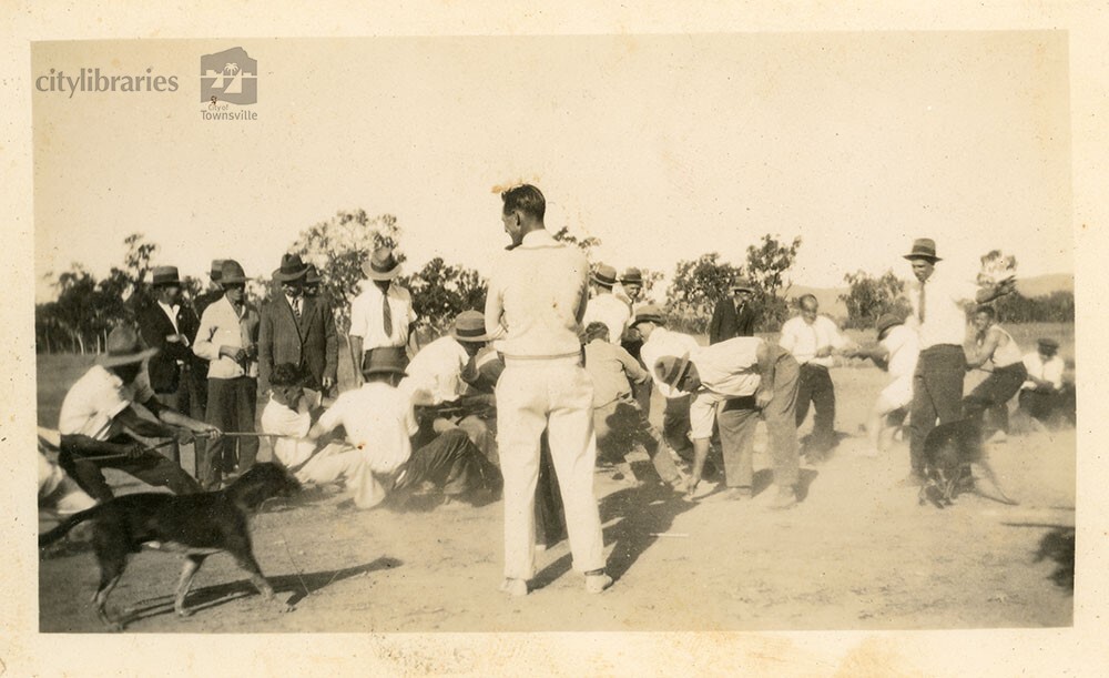 Men playing a game of tug of war, Townsville, 1936