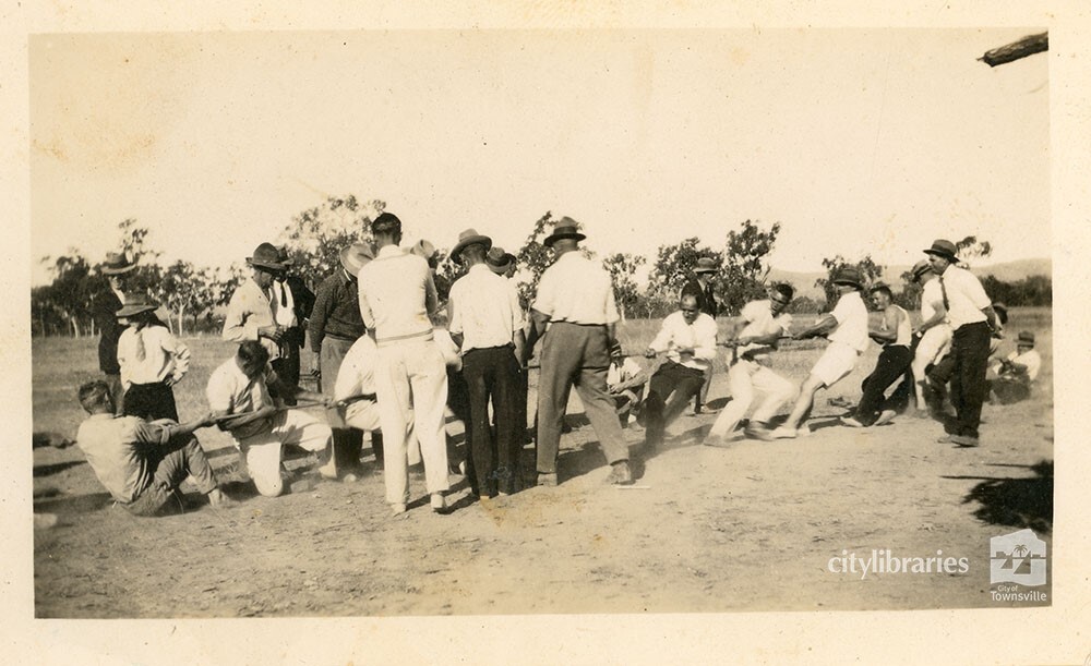 Men playing a game of tug of war, Townsville, 1936