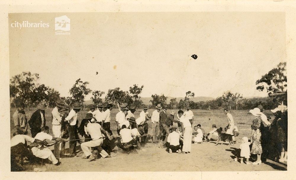 Men playing a game of tug of war, Townsville, 1936