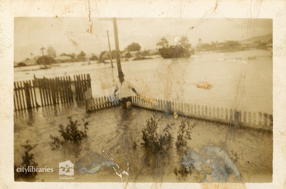 Front yard at 13 Townsend Street, Mysterton during floods, Townsville 1946