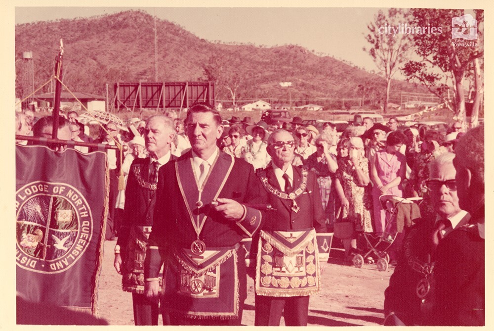 Freemasons and crowd at the laying of the foundation stone, Masonic Home for the Aged, Townsville, 1977