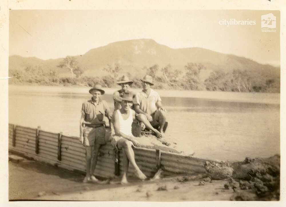P. Christopher, Bill Ellis, Steve Farrell and J. Gerard during works to raise the wall at Black Weir. May 1950