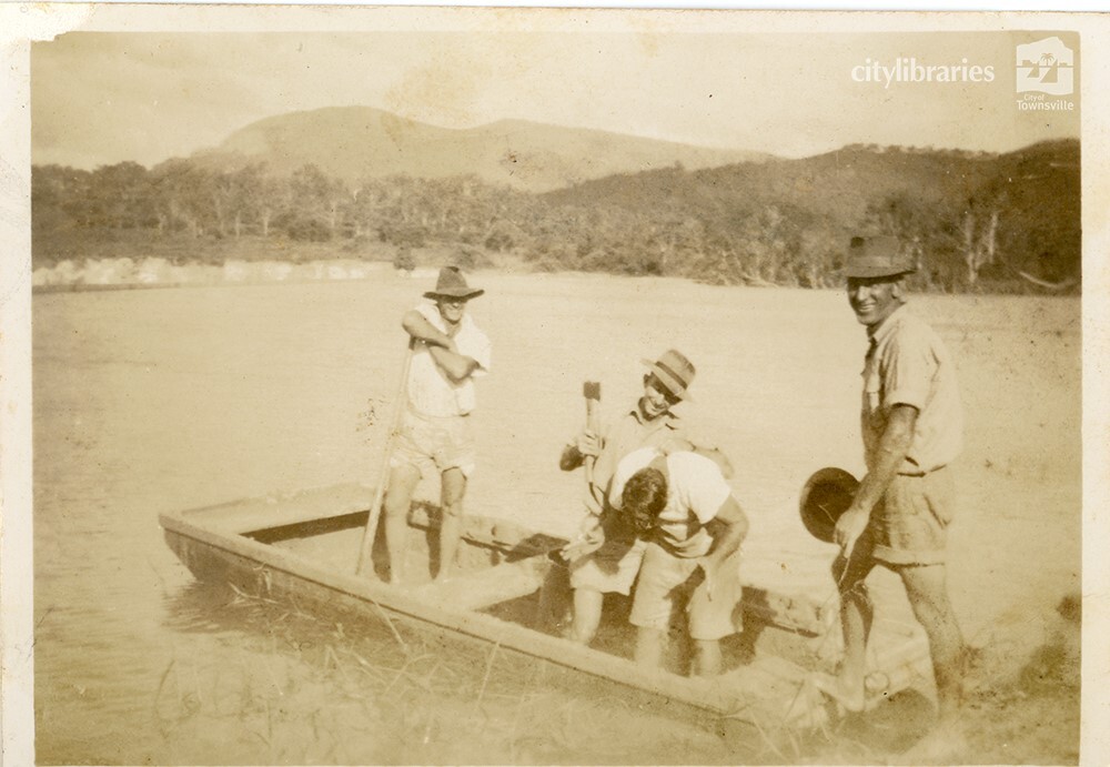 D. White, S. Farrell, P. Christopher and Henry Wilson during works to raise the wall at Black Weir, Townsville, May 1950