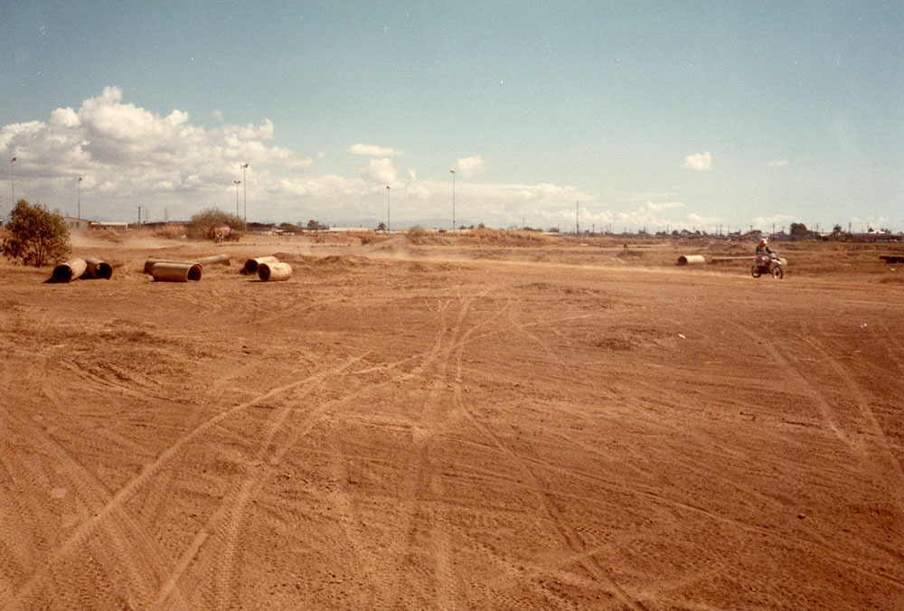 Proposed lake development area south of Woolcock Street with trail bike actvities in progress, Townsville, 1984