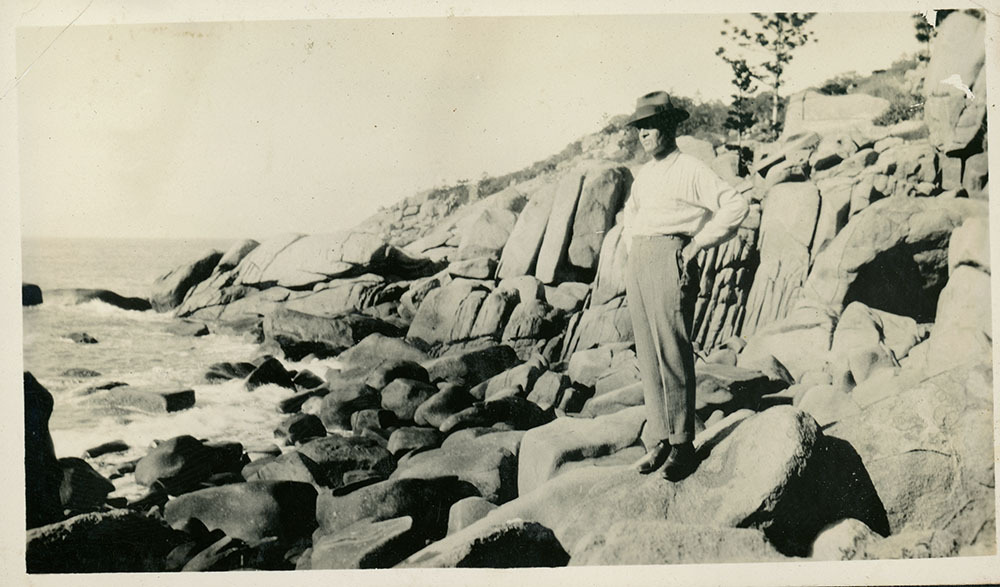 Arthur (Doug) Armstrong on the rocks at Alma Bay, Magnetic Island, [between 1908 and 1930].