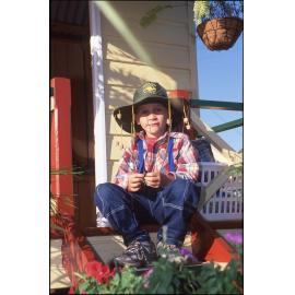 Child dressed for VP50 event, August 1995