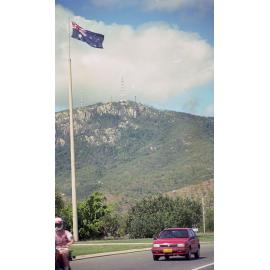 The flag and flagpole at the roundabout on the intersection of Angus Smith Drive and University Road, Douglas, Townsville, 1991