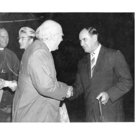 Townsville mayor, Alderman Angus Smith greets the Archbishop of Canterbury, Dr. Ramsey, April 1965. 