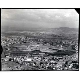 Townsville State High School and railway yards, aerial view, 1970
