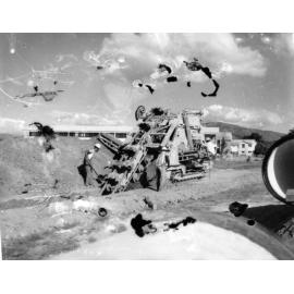 Trencher in action, Mount Louisa water supply scheme, Townsville, 1968 