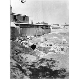 Open drain at the rear of Lowths Hotel, Stanley Street, Townsvill City, Townsville, 1903