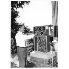 Townsville City Council employee, Arthur Jones, foreman plumber, turns on the new Anderson Park irrigation system, 8th April, 1970 