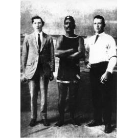 Douglas Pitt (centre), swam from Magnetic Island to Townsville, a distance of 6 miles, in 4 3/4 hours, 5 November 1921