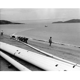 Laying the Magnetic Island water pipeline from Rowes Bay, Townsville, 1970. 