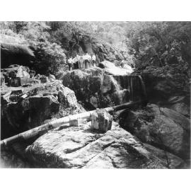 Aldermen and council staff inspecting the intake at Crystal Creek gorge, Mount Spec water supply scheme, Townsville, 1967. 