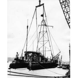William Willis' "Age Unlimited" being hoisted aboard the freighter Boanaroo, Townsville, 6th November, 1964. 