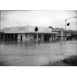 Flooding at Hanran's Motors, Charters Towers Road, Hermit Park, Townsville, 15 February 1968