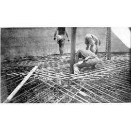 Placing floor steel, Perkins Street pump well, Townsville, November 1936. 