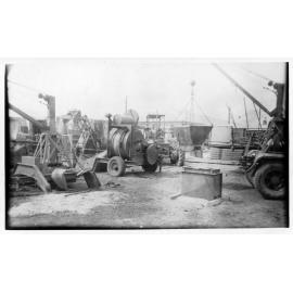 Filling a footing mould with concrete, Mount Spec pipeline, Townsville, 1948 . 