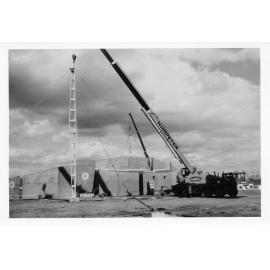 Work on roof pylons, during construction of the Dean Park soundshell. 