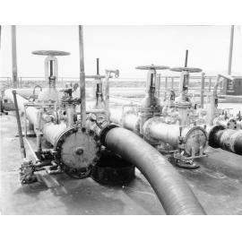 Oil line valves at the new oil terminal, designed by McDonald, Wagner and Priddle at the Townsville harbour, 1967