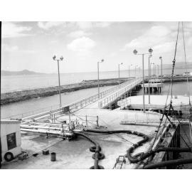 New oil terminal, designed by McDonald, Wagner and Priddle at the Townsville harbour, 16 April 1967
