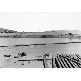 Reclamation area, western breakwater from new wharf, Townsville, December 1900 