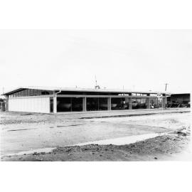 First building on the Harbour Board reclamation, South Townsville, Townsville, 11 October 1964