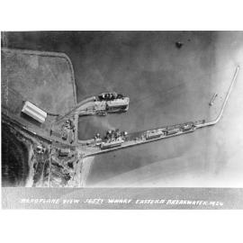 Jetty wharves, eastern breakwater, Townsville, aerial view 1924 