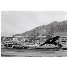 Cyclone Althea damage to Eagers used car yard, Flinders Street, Townsville, 1971