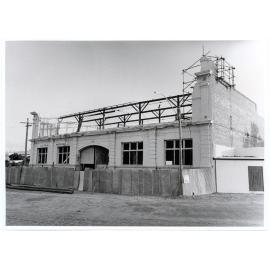 Demolition of the old steam laundry, formerly the Townsville Bond and Free Store, Flinders Street, Townsville, 30th September 1973
