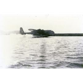 QANTAS flying boat landing inside the Townsville breakwater in 1942