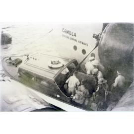 The launch Nestor landing troops on to Camilla for transport to Port Moresby, 1943-43
