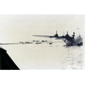 Three flying boats in a row within Townsville breakwater, 1942