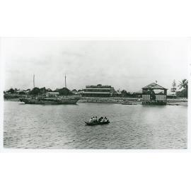 The Penny Ferry crossing Ross Creek with passengers and ferryman John Douglas,, Townsville 1926