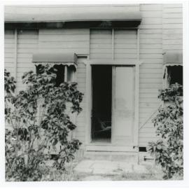 Side door entrance to a shop on the corner of Garrick Street and Margaret Street, West End, Townsville, 1966