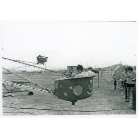 The Lions Merry Muster and the Octopus amusement ride, Townsville, 1 November 1973