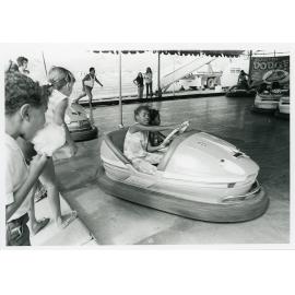 The Lions Merry Muster and children on the Dodgem Cars, Townsville, 1 November 1973