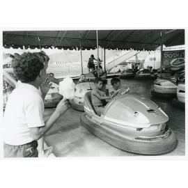 The Lions Merry Muster and children on the Dodgem Cars, Townsville, 1 November 1973